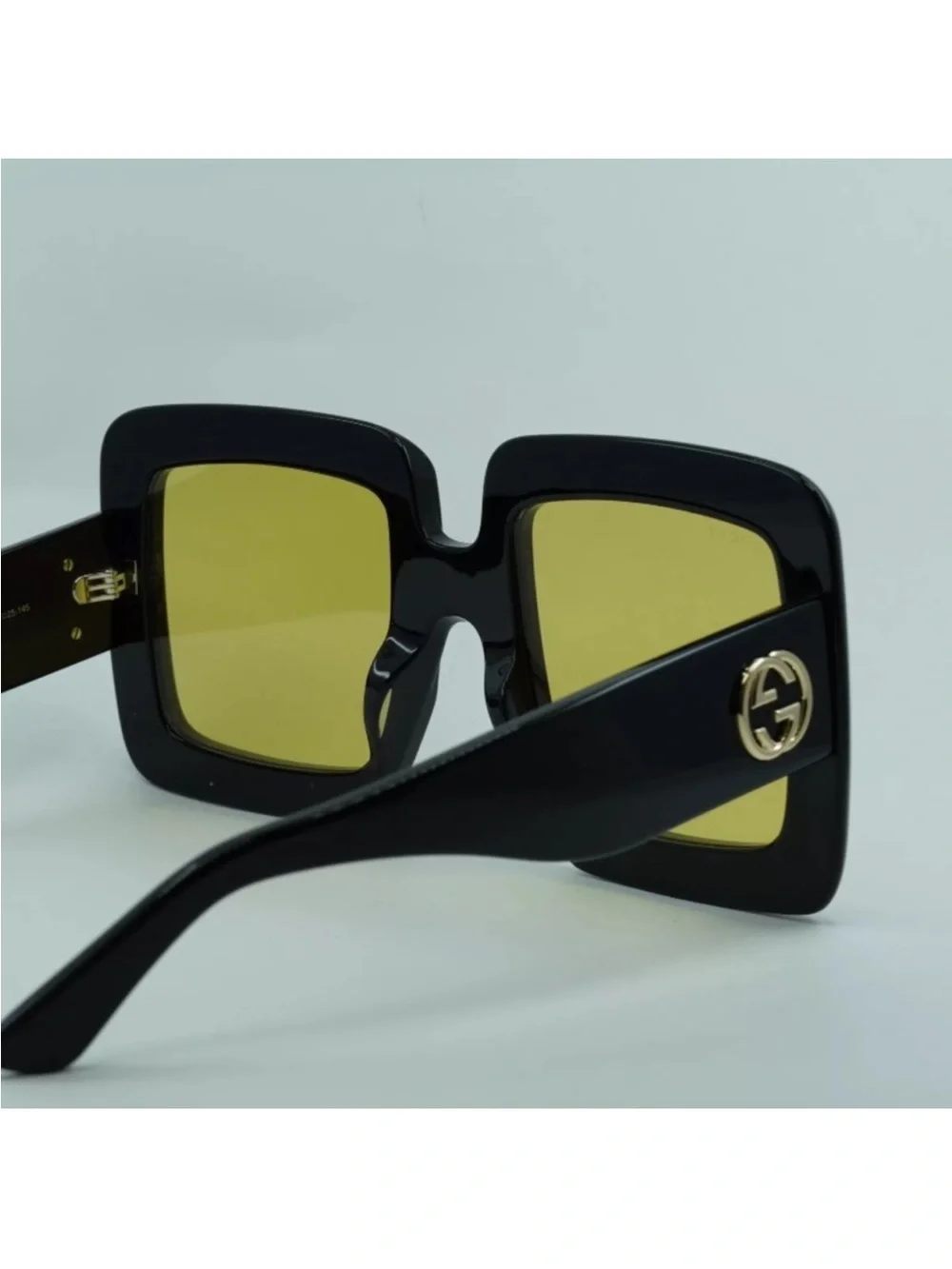 Gucci Black Frame Oversized Yellow Lens Square Sunglasses with Gold GG Accent